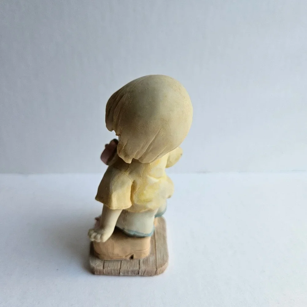 Vintage Style Boy Playing Paddle Ball Resin Figurine Collectible Home Decor